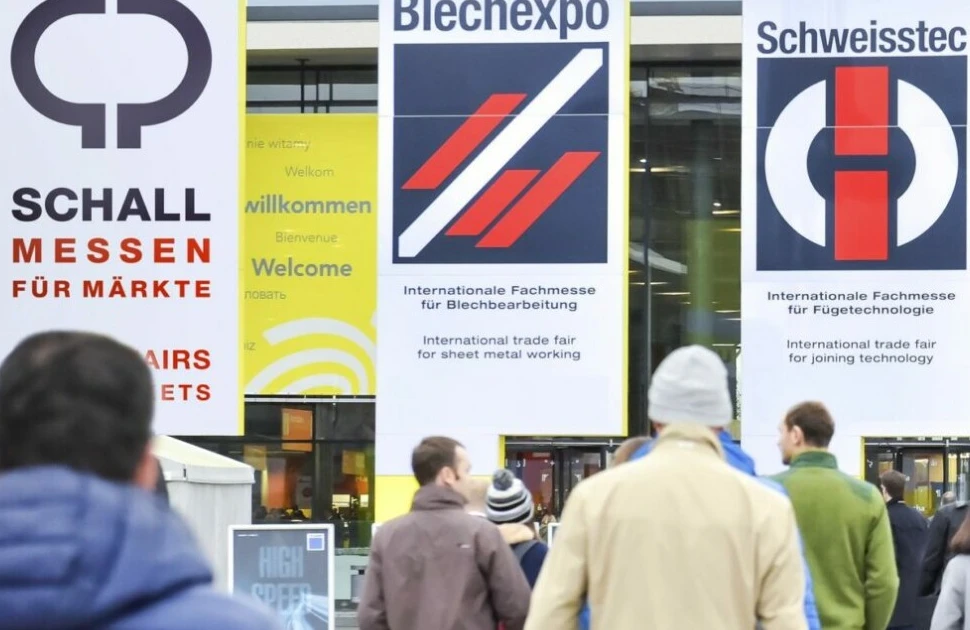Visitors enter Messe Stuttgart for the BlechExpo steel industry exhibition and trade fair 