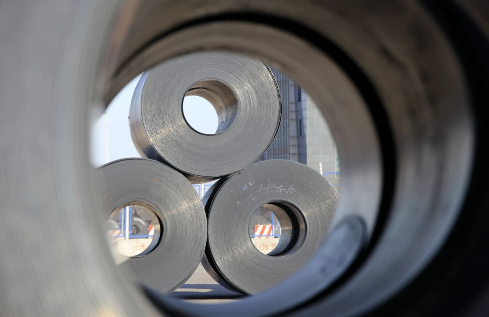 Three steel coils viewed through a steel coil