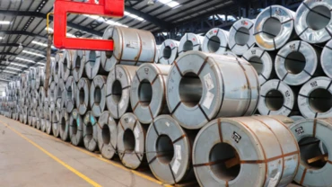 Steel coil stock in a warehouse