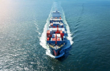 Cargo ship travels through open water